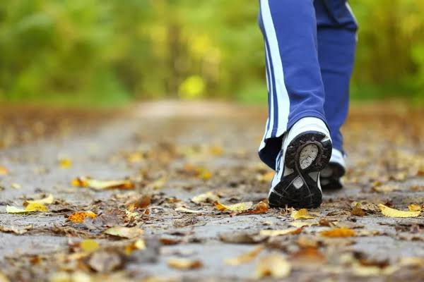 Feet walking in the leaves