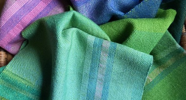 green and purple knitted scarf